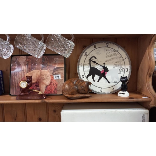 724 - A cat clock, wooden cat, and  other cat related items