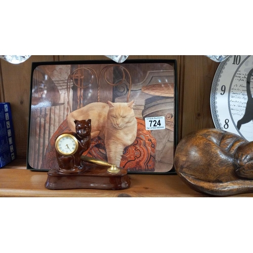 724 - A cat clock, wooden cat, and  other cat related items