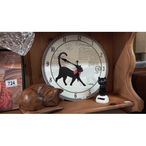 724 - A cat clock, wooden cat, and  other cat related items