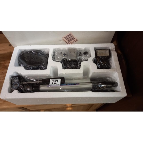 727 - A new boxed Ouyama camera and tripod kit