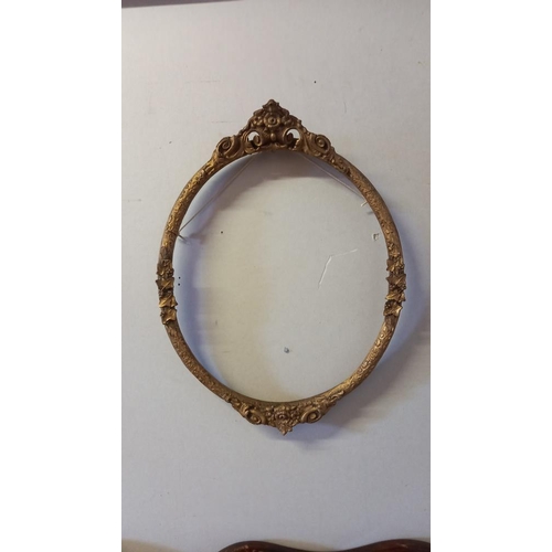 734 - 2 oval ornate picture frames