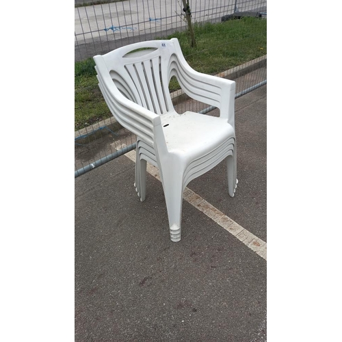 835 - 4 white plastic garden chairs COLLECT ONLY