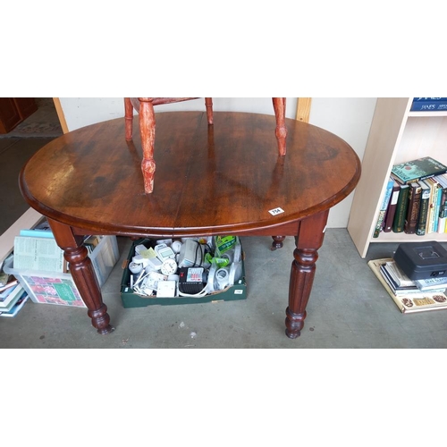 754 - An old mahogany extending table with 1 leaf on reeded legs COLLECT ONLY.