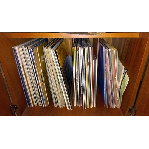 896 - A record cabinet and a quantity of LP records, COLLECT ONLY.