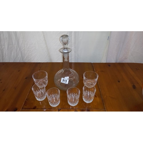 915 - A decanter and set of 4 and 2 glasses