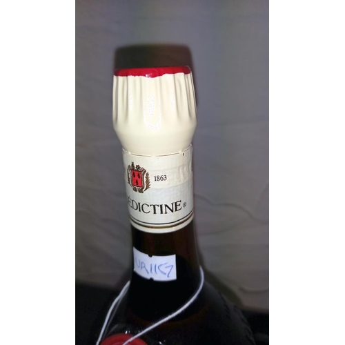 932 - A sealed bottle of Dom Benedictine liqueur