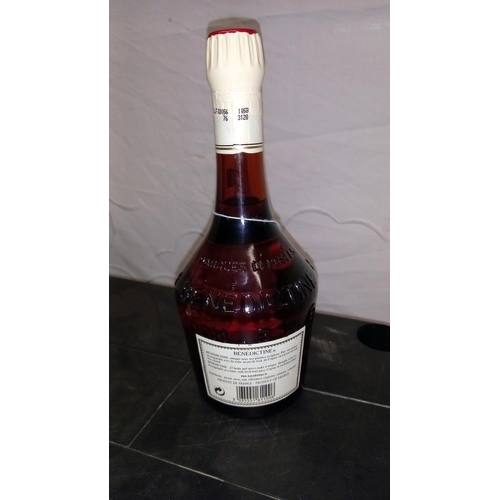 932 - A sealed bottle of Dom Benedictine liqueur