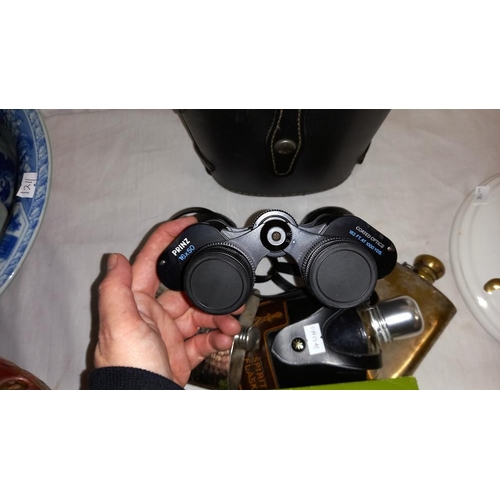 938 - A pair of Prinz binoculars 13 x 50, 3 spirit flasks and a magnifying glass