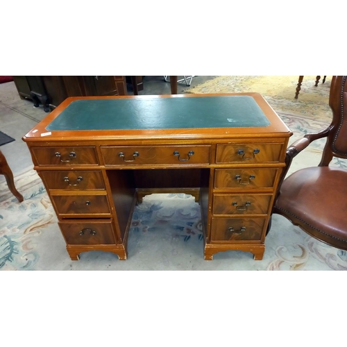 957 - A double pedestal desk with green leather top 110cm x 54cm x height 78cm COLLECT ONLY