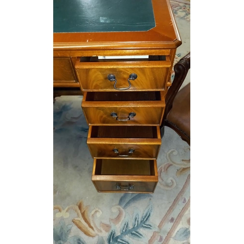 957 - A double pedestal desk with green leather top 110cm x 54cm x height 78cm COLLECT ONLY