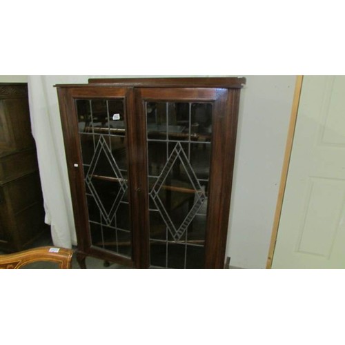 953 - A lead glazed display cabinet.  COLLECT ONLY.