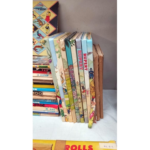 19 - A quantity of children's annuals including Rupert, Topper etc