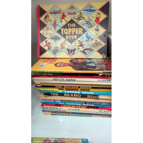 19 - A quantity of children's annuals including Rupert, Topper etc