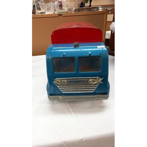 21 - A large 1950/60's Tri-ang pressed steel van with toy adverts on sides