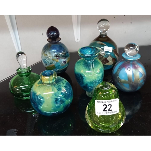 22 - A quantity of glass perfume bottles and paperweights including Isle of white glass ( 2 missing stopp... 