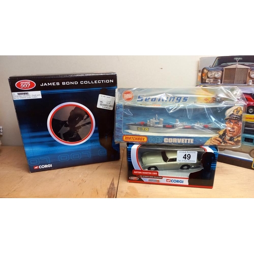 49 - A collection of boxed diecast including James Bond collection (tin inside box is still sealed), Corg... 