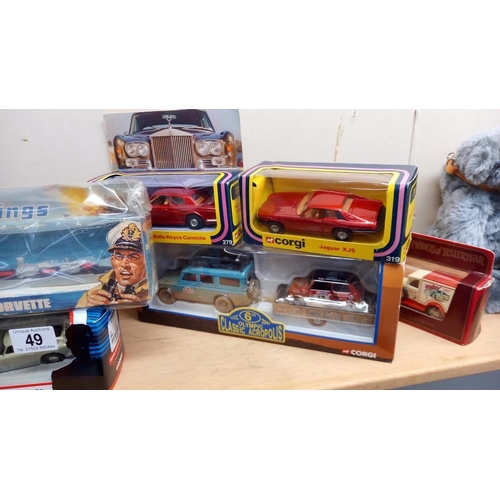 49 - A collection of boxed diecast including James Bond collection (tin inside box is still sealed), Corg... 