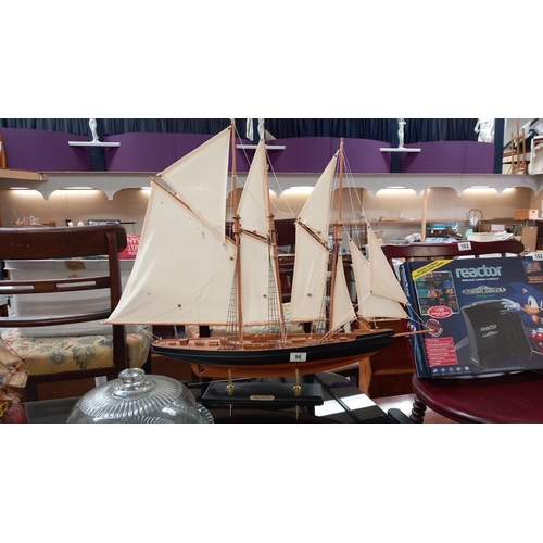 96 - A detailed wooden model of a sailing ship titled 'Atlantic' on stand, Length 82cm, height 68cm & 1 o... 