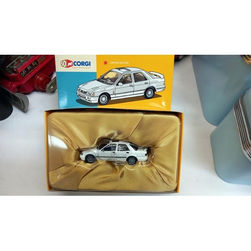 97 - 5 boxed Corgi 50th Anniversary models including Ford sapphire Cosworth etc.