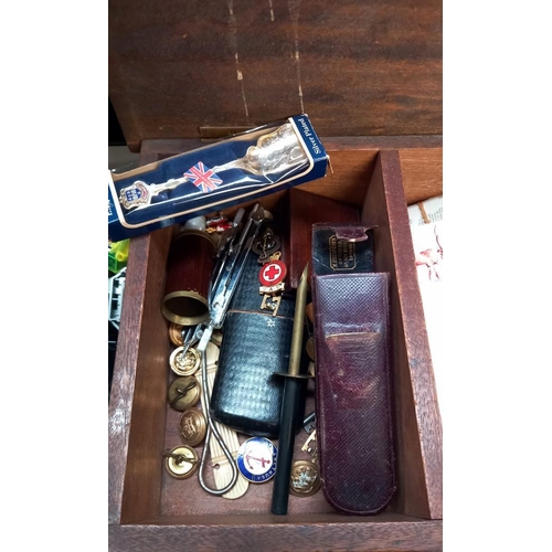 133 - A box of miscellaneous items including Dutch cards, cigarette cards, buttons, badges etc