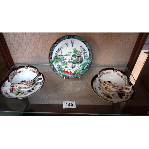 145 - A Tiffany & Co plate, 2 Chinese famile rose soup bowls with spoons and lids and 2 cups and saucers