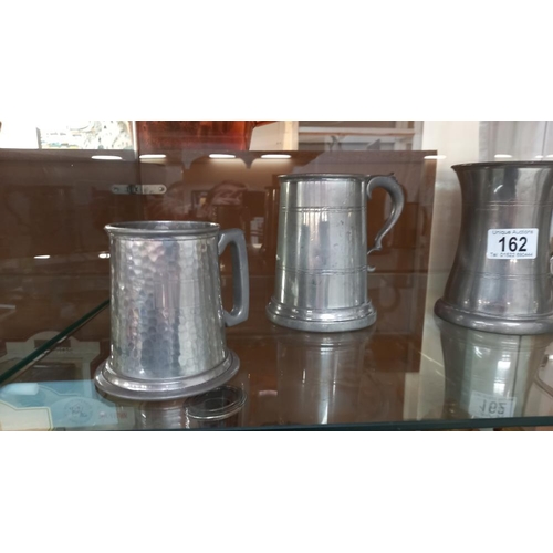 162 - 4 pewter tankards