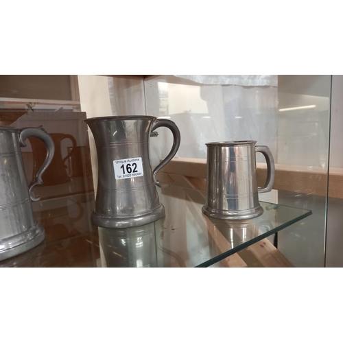 162 - 4 pewter tankards