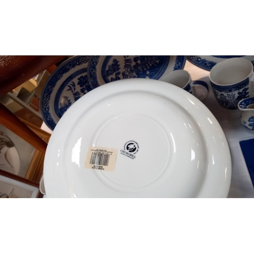 191 - A quantity of blue and white Churchill plates, mugs etc