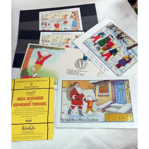 229 - A quantity of Rupert the Bear stamps etc including ingot puzzle game etc