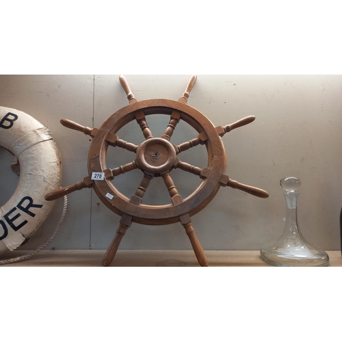 270 - A wooden ships wheel & a life buoy names 'ODB SALAMANDER' COLLECT ONLY