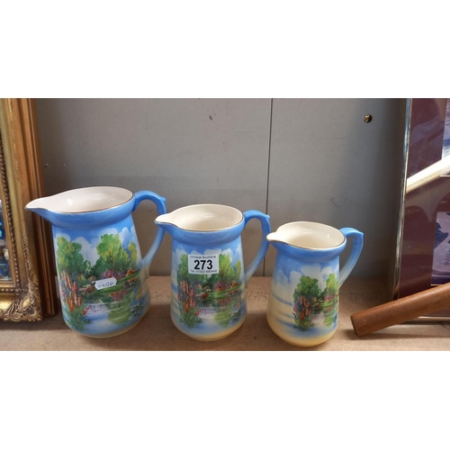 273 - A set of 3 graduated vintage pottery jugs