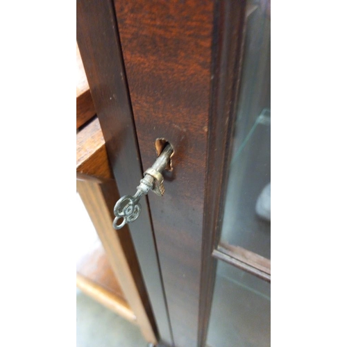 279 - An Edwardian mahogany astragal glazed display cabinet