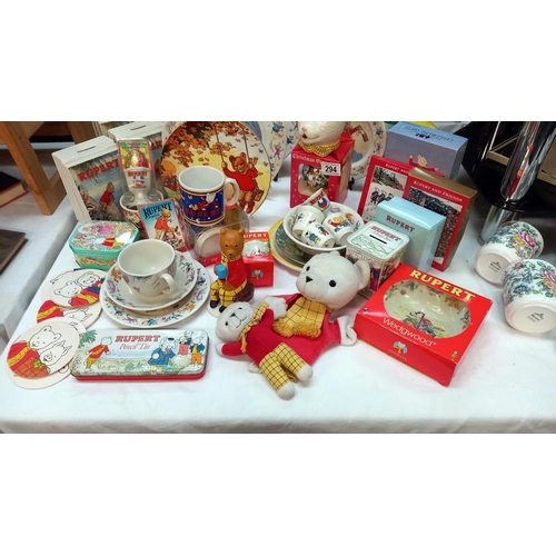 294 - A large good selection of Rupert the bear collectables including Wedgwood book moneyboxes etc