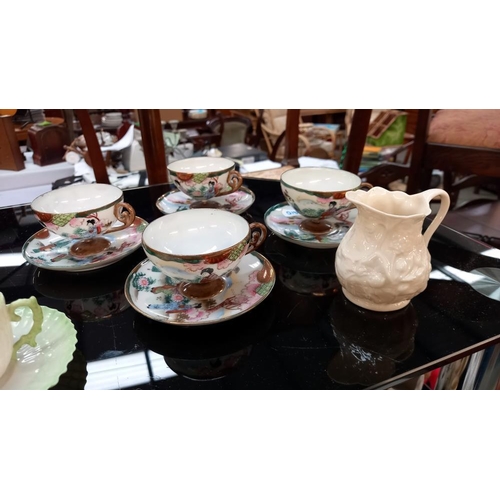 295 - A third period black mark 1926-1946 Belleek tea set (missing 1 saucer) plus an oriental 8 piece cup ... 