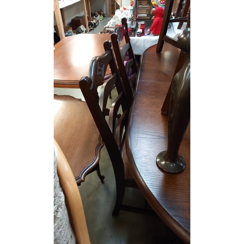 304 - A set of 6 oak dining chairs