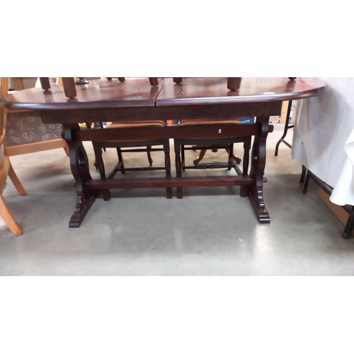 305 - A dark oak oval dining table COLLECT ONLY