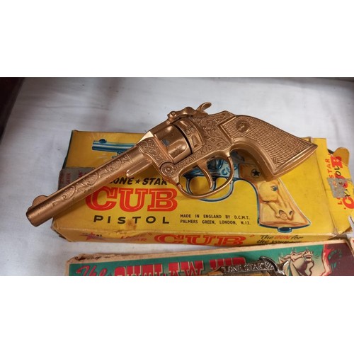 46 - A collection of boxed and unboxed Lone Star diecast cap gun pistols including Dick Turpin, The outla... 