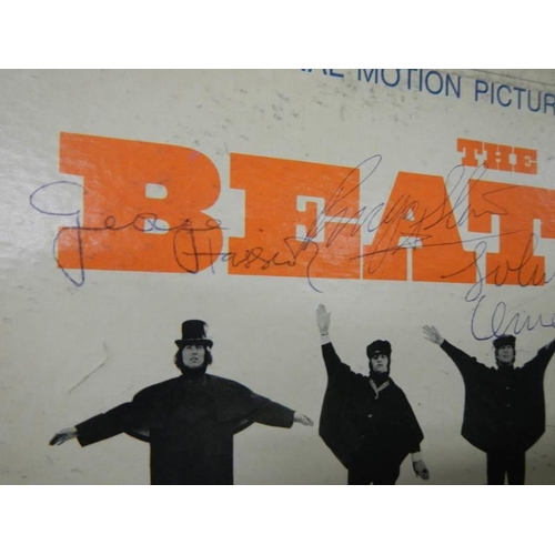 1570 - A framed and glazed Beatles disc collage with signatures (not authenticated), COLLECT ONLY.