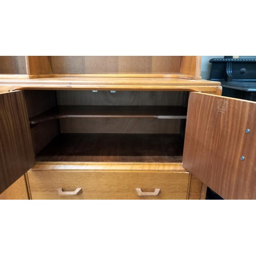 1572 - A 1950's light oak wall unit/sideboard with cupboard/drawer base with sliding cutlery tray & open ra... 