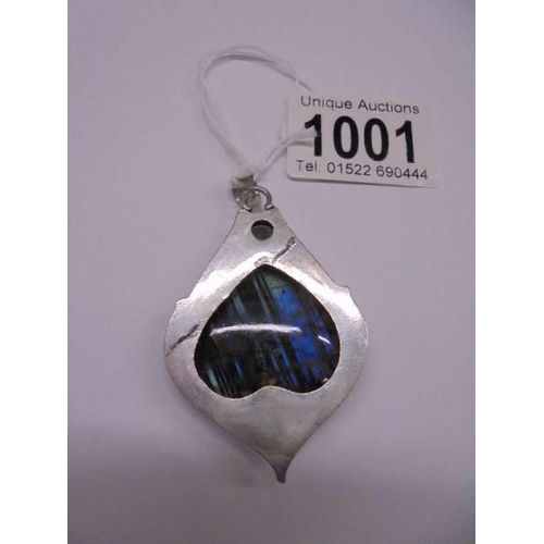 1001 - A large silver and quartz art nouveau style pendant.