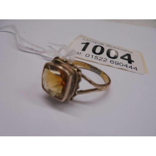 1004 - A yellow gold ring set citrine, size N, 2.9 grams.