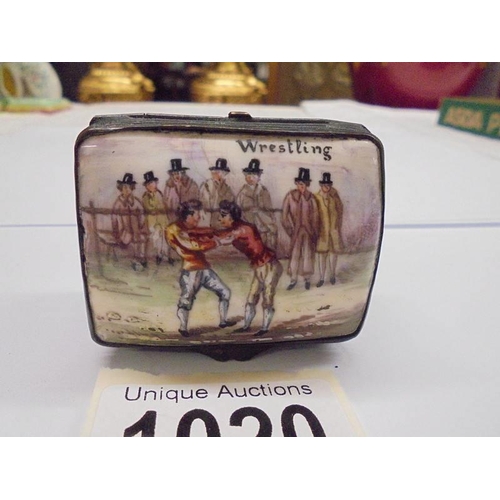 1020 - An 18th century enamel snuff box with a wrestling scene on lid, crack on bottom and a few nicks insi... 