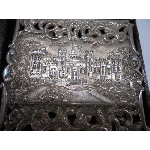 1028 - A cased Nathaniel Mills silver card case featuring Windsor Castle and Abbotsford House, Birmingham 1... 