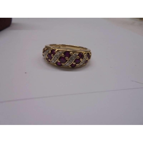 1044 - A 9ct gold garnet ring, size Q, 4.8 grams.