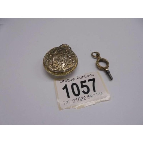 1057 - An Eppler ladies 17 rubies fob watch with key.