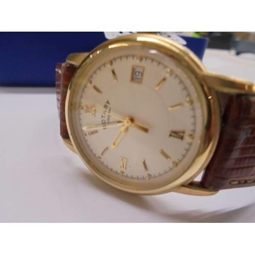 1058 - A Rotary gold plated gent's wrist watch with date function, in working order.