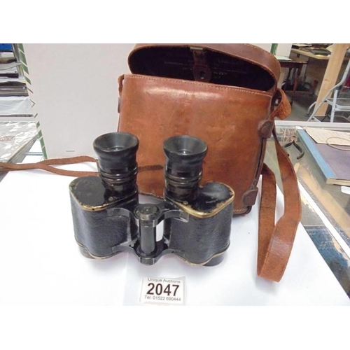 2047 - A cased set of Hunsicher & Alexis Paris military binoculars.