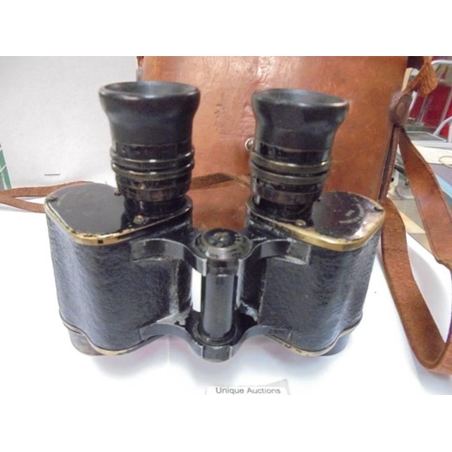 2047 - A cased set of Hunsicher & Alexis Paris military binoculars.