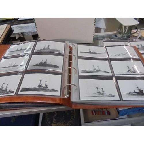 2078 - A large collection of approximately 1000 battleship & submarine related postcards in four albums and... 