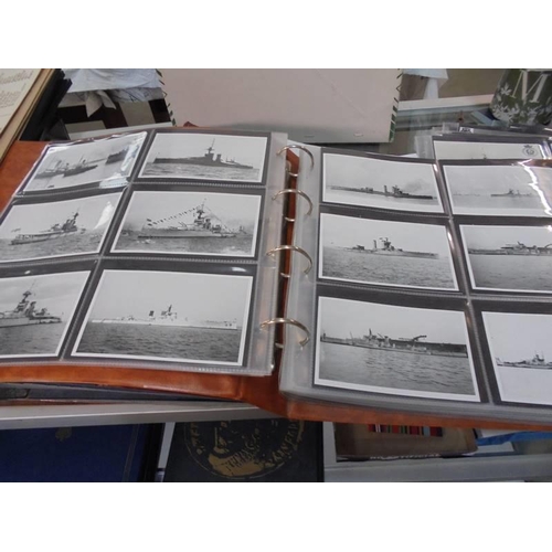 2078 - A large collection of approximately 1000 battleship & submarine related postcards in four albums and... 